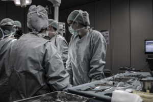 Medical professionals performing surgery in an operating theater